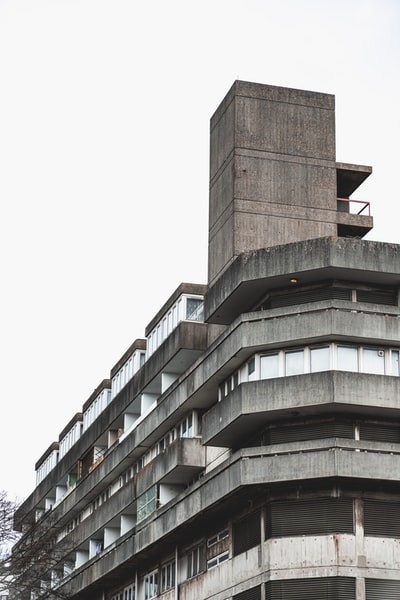 Brown concrete building during the day
